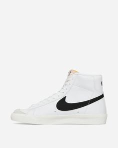 Nike WMNS Blazer Mid '77 Vintage Sneakers White / Black / Sail.One of Nike's historical models, which never goes out of trend. Conceived as a basketball shoe, it has evolved to become a lifestyle model to be worn every day, thanks to its ultra-soft high collar and the chance of wearing it anywhere..Leather Upper.Suede Overlays.Foam Tongue.Rubber Outsole.Style Code: CZ1055-100 White Throwback High-top Sneakers With Rubber Sole, Retro Nike High-top Sneakers For Skateboarding, Retro High-top Basketball Shoes With Gum Sole, Throwback Mid-top High-top Sneakers With Gum Sole, Classic Basketball Shoes With Gum Sole For Streetwear, Nike Sporty High-top Sneakers With Gum Sole, Classic Nike High-top Sneakers For Streetwear, Vintage White Sneakers For Streetwear, Nike Mid-top Sneakers With Rubber Waffle Outsoles