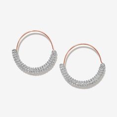 How about this for a hoop earring? Allum's contemporary design, with statement crystal curved bar detailing, will bring a little modern lift to just about any ensemble. Pair with a pair of pretty ballet flats and your favorite belt bag. Created with a sterling silver base and utilizing luxury 14 karat rose gold plating, this Adorn Luxe earring set is everything you love about our standard collection, but with a ‘demi-fine’ jewelry finish.