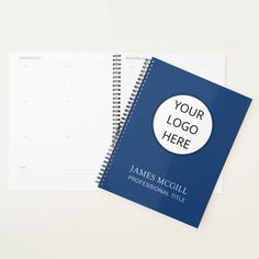 a spiral - bound notebook with a logo on the cover and a professional title pad