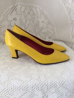 Vintage pumps Charles Jourdan Yellow Leather 8 (P.40) Brand: Charles Jourdan Paris Country of manufacture: France Registered size: 8 (US size) = 40 Shoe type: Pumps End: End era: 70s/80s Top material: leather Color: very pretty yellow Lining and underfoot: red and yellow leather Outsole: leather Heel: 6.5 cm / 2.55 inches Insole measurement 26 cm at 2 ends / 10.23 inches note some small traces on the leather at the back and at the end in front, see photos Very good vintage condition These shoes Retro Court Shoes With 4-inch Heel And Pointed Toe, Vintage Yellow Pointed Toe Heels, Retro Pointed Toe Court Shoes With 4-inch Heel, Yellow Court Shoes With 4-inch Heel And Round Toe, Yellow Closed Toe Formal Court Shoes, Yellow Pointed Toe Court Shoes For Formal Occasions, Yellow Closed Toe Court Shoes For Formal Occasions, Yellow High Heel Court Shoes For Formal Occasions, Yellow Formal Heels Medium Width