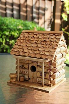 a birdhouse made out of wood is featured on the facebook page for this post