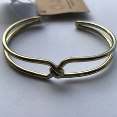 Gold Colored Knot Cuff. Adjustable. Handmade In India. Square Wire Jewelry, Handmade Chain Jewelry, Handmade Copper Bracelet, Jewelry Magic, Juicy Couture Charms Bracelet, Copper Bracelets, Bracelet Inspiration, Wrapped Rings, Aluminum Jewelry