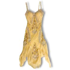 This Is A Stunning Vintage Silk Dress From Sue Wong From The Nocturne Line, Featuring A Beautiful Beaded Pattern And Trim That Gives Off A Art Deco Vibe. The Dress Is Like A Golden Cream Color. It Is In Fabulous Pre-Owned Condition! Size 2. Fitted Fairy Dress For Fancy Dress, Fitted Fairy Dress For Fancy Dress Occasions, Fairy Style Sleeveless Fitted Dress, Fitted Sleeveless Fairy Dress, Yellow Embellished Silk Dress, Fairy Style Fitted Dress For Fancy Dress Events, Art Deco Fairy, Sue Wong Dress, Vintage Silk Dress