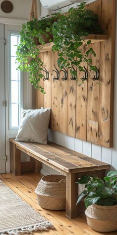 a wooden bench sitting next to a potted plant on top of a wooden shelf