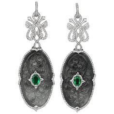 For Sale on 1stDibs - A pair of drop earrings set with carved and pierced oval grey jade plaque, centered with an oval-cut emerald, both in a brilliant-cut diamond surround Jade Design, Antique Jade, Chinese Jewelry, Jade Crystal, Diamond Jewelry Designs, Jade Earrings, Crystal White, Earrings Pendant, Art Nouveau Jewelry