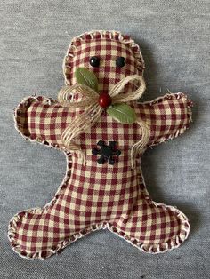 a red and white gingham fabric teddy bear