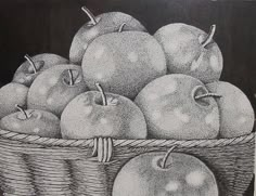 a black and white drawing of apples in a basket