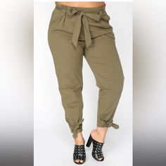 Fashion Nova Olive Cargo Pants Size Medium Pants Are New With Tag And Can Be Dressed Up Or Down To Fit Your Style. High Rise Woven Fabric No Stretch Oversized Fit Cinch Waist Pull Tie Waist And Ankle Tie Skinny Leg Approximate Measurements Laying Flat: Waist: 15" Hip: 23 3/4" Length: 38" Rise: 11" Tags: Cargo, Camo Pants, 100% Cotton, Comfortable, Casual, Dress Up, Soft, Wearable, Flattering Trendy Paperbag Waist Pants With Elastic Waistband, Trendy Paperbag Waist Pants For Spring, Trendy Spring Pants With Paperbag Waist, Trendy Spring Paperbag Waist Pants, Casual Spring Pants With Paperbag Waist, Casual Paperbag Waist Pants For Spring, Casual Spring Paperbag Waist Pants, Casual Khaki Paperbag Waist Bottoms, Casual Khaki Paperbag Waist Pants