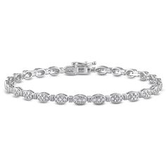 This pretty tennis bracelet is crafted in lustrous sterling silver and features pave-set diamonds placed in a cluster pattern in oval motifs. Enhanced with a high polished finish, this diamond bracelet makes a valuable addition to any jewelry collection. Coordinate this bracelet with any casual or business attire and look stunning. The diamonds are 1/2ctw, J or better in color, and I3 in clarity. This bracelet measures 7.5 inches in length and 3.8mm in width. Classic Link Diamond Bracelet For Anniversary, Formal Link Bracelet With Diamond Cut, Classic Hand Set Oval Bracelets, Formal Diamond-cut Link Bracelet, Formal Diamond Cut Link Bracelets, Elegant Round Diamond Bracelet With Solid Link Construction, Elegant Round Diamond Bracelet With Solid Link, Elegant White Gold Oval Link Jewelry, Timeless Round Diamond Cut Chain Bracelet