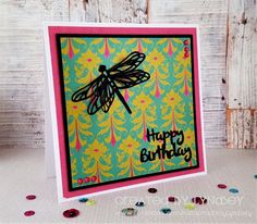 a birthday card with a dragonfly on it