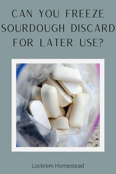 a bag filled with white marshmallows sitting on top of a table