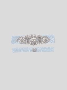 Embrace tradition with our delicate Something Blue Bridal Garter Set. Crafted from stretch lace, this set exudes romantic elegance, while the silicone lining ensures a secure, comfortable fit that won't slip throughout your special day. The set includes two garters, allowing you to embrace the beloved ritual of the garter toss while keeping a cherished memento for yourself. The toss garter, adorned with a dainty bow, is the perfect accessory to playfully toss to your eager guests, symbolizing yo White Lace Garter Bridal, Bridal Garter Crystal, Blue Bridal Garter, Baby Blue Thigh Garter, Lace Garter Set, Garter Toss, Blue Garter, Something Blue Bridal, Bridal Garters Set