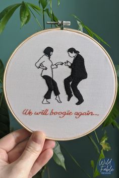 a hand embroidered picture of two people dancing with the words we will boogie again on it