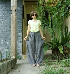 "A simply soft, comfy, wide leg boho gaucho pants with 2 patched pockets and elastic waist. Every day fit from day to night with this comfy pants or even make it as your favorite traveling pants. Perfect pieces for the summer and spring. Easy pair it with simple top. Material: double gauze cotton, elastic band Weight: 314g Measurement: free size pants (approximately) Elastic waist: 28\"-42\"  (with adjustable drawstring) Hip: 54\" can fit up to hip max 48\" Length: 38\" Inseam length: 27\" - col Bohemian Wide Leg Loungewear Pants With Pockets, Baggy Gray Harem Pants For Summer, Bohemian Relaxed Fit Wide Leg Harem Pants, Gray Wide Leg Harem Pants For Summer, Comfortable Baggy Wide Leg Pants, Summer Gray Wide Leg Pants With Pockets, Gray Wide Leg Pants For Summer, Gray Wide Leg Pants With Pockets For Summer, Comfortable Wide Leg Harem Pants