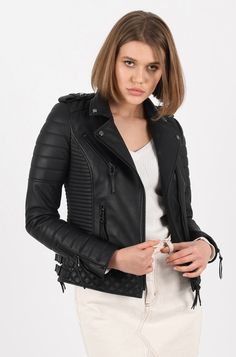 Tight fit biker style leather jacket. Double front fastening zips. Quilted detail & side buckles. Genuine Black Leather Womans Jacket 100% Lambskin Black metal zips/hardware Tight fit Quilted detail Tailored Lapels 2 Outside zipped pockets plus inside pocket which fits an iphone (zipped) Premium Lined Chic/Modern Can be worn anywhere (PLEASE CHECK OUR SIZING GUIDE BEFORE ORDERING) Long Sleeve Leather Jacket For Biker Events, Long Sleeve Biker Jacket With Zipper For Biker Events, Fall Biker Leather Jacket With Ykk Zipper, Fitted Winter Biker Jacket With Metal Zipper, Fitted Leather Jacket With Metal Zipper For Winter, Fitted Biker Jacket With Metal Zipper For Winter, Fitted Moto Leather Jacket With Zipper Closure, Punk Leather Jacket With Zipper For Winter, Biker Leather Jacket With Metal Zipper For Winter