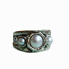 Final Sale-This ring isn’t your grandmother’s pearl ring. This handcrafted piece of jewelry is made with three beautiful freshwater pearls and a sterling silver band with a swirl detail that creates a unique statement. The ring's band tapers to offer a comfortable and secure fit. Wear this unique sterling silver and freshwater pearl ring for a night out on the town. Or, just as easily, pair it with your favorite jeans and t-shirt to take this unique pearl ring for a casual spin. .925 sterling si Jewelry Goals, Afro Jewelry, Rock Ring, Body Decor, Unique Silver Rings, Rock Rings, Unique Silver Jewelry, Freshwater Pearl Ring