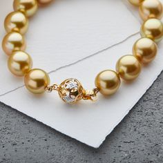 Our exquisite Golden South Sea Pearls and contemporary gold clasps breathe fresh life into a timeless style. For someone comfortable in pearls, this bracelet can transition seamlessly from the occasional evening wear to an everyday lifestyle piece. Golden South Sea Pearls, Sea Pearl, South Seas, South Sea Pearls, Sea Pearls, Pearl Bracelet, Timeless Style, Evening Wear, Timeless Fashion