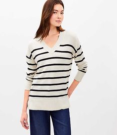 A luxe cashmere-effect knit elevates this everyday essential into an irresistible must have. V-neck. Long sleeves. Side slits.,Bullet1:27" long,Imported:Imported,Fit:Fit: Relaxed — an easy shape that's just shy of loose,Length:Length: Tunic - hits at thigh,Fabrication:60% Acrylic 40% Nylon,Garment Care:Machine Washable Loft Striped Luxe Knit V-Neck Tunic Sweater Size XL Soft Sandstone Women's by Loft Size Regular - XL Soft Sandstone Women's Cotton, Blend, V-Neck, Long, Sleeve, Tunic, Sweaters, E Cocoon Sweater, Petite Sweaters, Cashmere Blend Sweater, Sweater For Women, Grey Outfit, Sweater White, Petite Tops, Navy Sweaters, Tunic Sweater