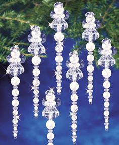 crystal beaded ornaments hanging from a christmas tree