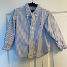 Like Brand New! Size 24 Month Ralph Lauren Blue And White Pinstripe Classic , Crisp Oxford! Perfect For The Holidays Ralph Lauren Striped Shirt For Spring, Ralph Lauren Striped Collared Tops, Spring Striped Ralph Lauren Top, Ralph Lauren Blue Tops With Button Closure, Ralph Lauren Blue Top With Buttons, Blue Ralph Lauren Tops With Button Closure, White Long Sleeve Ralph Lauren Shirt, Ralph Lauren Striped Long Sleeve Tops, Ralph Lauren Blue