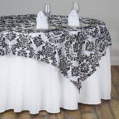 PRICES MAY VARY. ✨IMPRESS YOUR GUESTS – Our flocking damask taffeta table overlays will help you to create a sophisticated and unique look for your event, these table overlays with rich texture will beautifully dress up your party tables. ✨HIGH-QUALITY – This high-quality table overlay features an elegant taffeta bottom and romantic velvet flocking design. ✨PERFECT FOR ANY EVENT – Use them at wedding ceremonies and receptions, bridal showers, baby showers, quinceaneras, anniversary parties, or a Square Overlay, Catering Table, Reception Table Decor, Thanksgiving Dinner Table, Table Overlays, Party Table Cloth, White Damask, Table Skirt, Linen Fashion