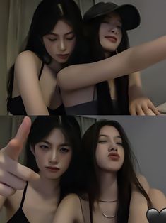 two women are posing for the camera with their arms around each other and one is holding her hand up