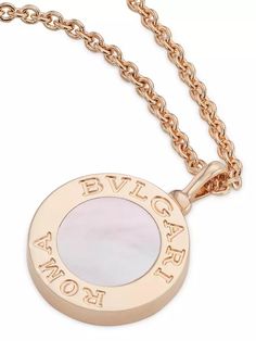 An elegant fusion of Roman heritage and contemporary design, BVLGARI's pendant necklace is crafted of 18K rose gold. Inspired by the inscriptions on ancient coins, it features a pendant with a mother-of-pearl insert and dazzling pavé diamonds with the label's signature double logo border..Diamonds 0.25ct tcw.Mother of pearl.18K rose gold.Clasp closure.Made in Italy.SIZE.Adjustable 17' length.ABOUT THE BRAND.Founded in Italy in 1884 by Greek silversmith Sotirio Bulgari, BVLGARI has become synonym Logo Border, Pearl Diamond Pendant, Bvlgari Jewelry, Ancient Coins, Pearl Diamond, Diamond Pendant Necklace, Exquisite Jewelry, Free Jewelry, 18k Rose Gold