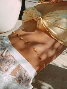 Body Chain Details Design: Gold body chain with yellow, dark brown, ombre cream crystal beads and gold beads Length: S/M - 29" + 5" extender | M/L 35" + 5" extender Metal: 3x dipped 14k gold over hypoallergenic brass. High quality plating details below Crystal: Exclusive Oomiay glass crystals Dark Brown Ombre, Gold Body Chain, Gold Bodies, Brown Ombre, Chrysanthemum, Gold Beads, Crystal Glass, Crystal Beads, Design Details