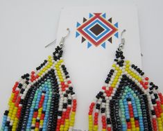 Beautiful Native American Style handmade earrings. Stainless steel ear wires and all made by ethnic artisans. Beautiful new colors and styles for matching regalia or wearing alone. Great price and free shipping! Multicolor Fair Trade Beaded Earrings For Festival, Fair Trade Multicolor Beaded Earrings For Festival, Southwestern Multicolor Teardrop Beaded Earrings, Traditional Multicolor Teardrop Beaded Earrings, Traditional Multicolor Fair Trade Earrings, Native American Style, Handmade Earrings Beaded, Design Seeds, Native American Fashion