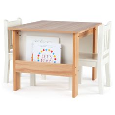 a wooden table with two chairs and a magazine rack on it's back side