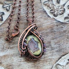 Rainforest Jasper Pendant Wire Wrapped in Antiqued Copper Wire. - Etsy Bohemian Jewelry In Copper Wire With Patina, Rustic Wire Wrapped Copper Jewelry, Bohemian Hand Forged Copper Jewelry, Hand Forged Copper Bohemian Jewelry, Rustic Hand Wrapped Copper Jewelry, Rainforest Jasper, Jasper Pendant, Oct 30, Antique Copper