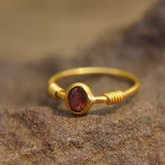 24k gold red sapphire ring//artisan red sapphire ring//24k gold ring//24k gold hand made sapphire ring//artisan gold sapphire ring This collection of rings has beautiful unique colorful stone.   stone is beautiful sapphire 5.3x3.5 mm.                       I used 24k gold for the setting and 22k for the rest of the wire. (1.2 mm thick). I also do custom order, feel free to contact me. The jewelry will be packed in a gift box and is ready to give as a gift. Your jewelry will be shipped via regist Red Sapphire Birthstone Ring In 14k Gold, Heirloom Red Sapphire Ring, Classic Red Sapphire Ring In 14k Gold, 22k Gold Ruby Gemstone Ring As Gift, Red 22k Gold Rings For Gift, 22k Gold Ruby Ring For Gift, Handmade 14k Gold Sapphire Ring, 22k Gold Ruby Ring Gemstone For Gift, Red Sapphire Ring