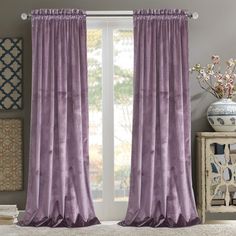 the curtains in this room are purple