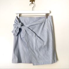 New Without Tags! Anthropologie Maeve Light Blue Wrap Skirt Bow Tie Detail On Side Mini Length Back Zip Closure Size 6 Skirt Has Lots Of Stretch! No Flaws Of Any Kind All Prices Are Negotiable Spring Workwear Mini Wrap Skirt, Chic Fitted Blue Wrap Skirt, Blue Pencil Skirt Skort For Spring, Blue Cotton Skirt For Brunch, Chic Blue Skort For Day Out, Blue Pencil Skirt Skort For Summer, Chic Blue Lined Wrap Skirt, Elegant Blue Skort For Summer, Blue Pencil Skirt For Day Out