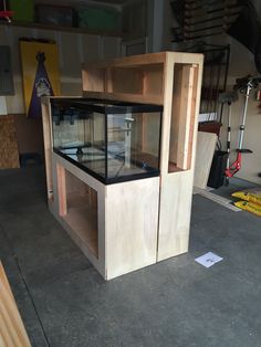 a fish tank in the middle of a garage