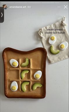 an egg and avocado grid on a plate next to a small bag with eggs in it