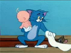 an animated image of a cat holding a baby in it's arms and another cartoon character