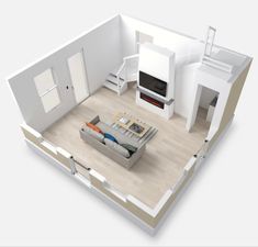 an overhead view of a living room and kitchen area in a model home with wood flooring