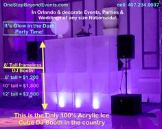 an event with purple lighting and dj booth