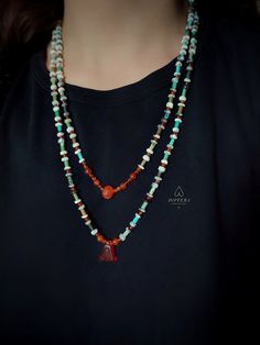 Featuring carnelian, dendritic opal, Persian turquoise and sterling silver, this one-of-a-kind ancient necklace gets inspiration from thousands of years old designs of the ancient Egyptian civilization. It is ethically handcrafted in my tiny silversmithing studio, by the Aegean Sea. At the double stranded center of this necklace, there is both is a gorgeous carved melon carnelian bead and a carved carnelian lotus amulet pendant. This unique design is completed by stringing carnelian, dendritic o Bohemian Beaded Necklace With Green Onyx, Bohemian Green Onyx Beaded Necklace With Natural Stones, Bohemian Turquoise Chalcedony Necklace, Bohemian Chalcedony Round Beads Jewelry, Bohemian Green Onyx Beaded Necklaces As Gift, Handmade Turquoise Carnelian Jewelry, Bohemian Green Onyx Beaded Necklaces, Handmade Green Onyx Bohemian Necklace, Bohemian Green Onyx Beaded Necklace For Gift