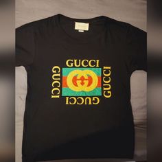 Authentic Gucci T-Shirt Glitter Letters . Fits A Small, Medium Or Large Because The Shirt Is A Stretch Material. Gucci Top, Gucci T Shirt, Glitter Letters, Gucci Black, The Shirt, Colorful Shirts, Glitter, Womens Tops, Tops & Tees