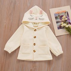 Pattern: solid color, cartoon Color: beige Height: 90CM, 100cm, 110cm, 120cm, 130cm Sleeves: long sleeves Thickness: normal Fabric: Cotton Gender: girl Launch: Winter 2021 Season: spring, autumn and winter Toddler Coats Girl, Solid Sweaters, Patches Jacket, Toddler Kids, Beige Sweater, Kids Sweater, Jackets Online, Fashion Tops, Long Coat