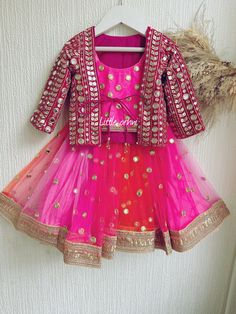 ✨ Girl blush pink bright  Lehenga is a beautiful dress that will keep your little girl happy and looking adorable all day long. ✨ The Gorgeous  Pink & orange  Lehenga with jacket is perfect for any occasion. The stunning  pink lehenga comes with a jacket only ( no chunni ) . This beautiful and elegant Indian outfit is made of a soft fabric that is perfect for those looking for a comfortable yet beautiful outfit for any occasion. The blouse features a feminine pink color embroidery.  ✨ This Beautiful Lehenga is ideal for the festive season and perfect for those wanting to celebrate with their little ones. This beautiful Indian outfit is perfect for any occasion and the beautiful design is a perfect contrast to the vibrant colors and will surely make a statement. The  pink lehenga and jacket Pink Ruffled Choli For Navratri, Festive Pink Lehenga With Ruffles, Pink Ruffled Lehenga For Diwali, Pink Ruffled Sets For Eid, Pink Ruffled Sharara For Festivals, Pink Anarkali Dress With Ruffles, Bollywood Style Pink Sets With Gota Work, Festive Pink Ruffled Anarkali Set, Festive Pink Ruffled Sharara