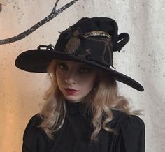 "A fancy witch hat with a large 3D needle felted bat gracing the front and crisscrossed in back with black velvet ribbon. The dimensions are approximately 15\" across and 10\" deep from brim to the top of the curly point. The point is reinforced with wire allowing you to position it however you like. The brim is bound in black Dupioni silk. How to measure your head: Use a soft measuring tape and measure around the middle of your forehead above the ears, and at the tightness you are comfortable w Felt Witch Hat, Black Velvet Ribbon, Summer Goth, Larp Costume, Black Witch, Elf Hat, Dupioni Silk, Black Moon, Hand Felted