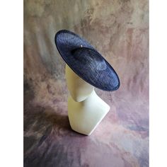 "One contoured saucer with a slight upturned brim hat sinamay straw fascinator / hat base in navy blue that measures approximately 13\" in diameter. The base is contoured to fit against the head. The edges of the brim are finished in sinamay. The multi-layer stiffened sinamay straw has a great sturdy weave and provides excellent support for your millinery creations. This is NOT a finished ready to wear hat and it will not stay on your head unless you add a head band to wear. Add embellishments of your choice. A nice high quality base - I know you'll be pleased! This hat base is listed separately in red, royal blue, gray, fuchsia, baby blue, ivory, rose pink, green, and black. Check my listings for those options... Lots of hat bases and millinery supplies listed in my shop   www.etsy.com/sh Fitted Sinamay Boater Hat With Curved Brim, Fitted Sinamay Boater Hat With Short Brim, Fitted Navy Wide Brim Hat, Navy Fitted Wide Brim Hat, Fitted Sinamay Boater Hat With Flat Brim, Navy Fitted Hat With Short Brim, Fitted Navy Hat For Kentucky Derby, Adjustable Sinamay Boater Hat For Royal Ascot, Navy Formal Hat With Curved Brim