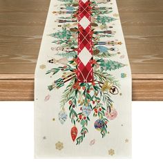 a table runner with christmas decorations on it