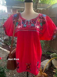 "Blouse STYLE DETAILS Overview * soft cotton fabric * round-neck * hand embroidered design * short sleeves * mid thigh Fit & sizing Red: 37\" Bust (all around) 33\" Long Beige: 38\" Bust (all around) 33\" Long Black 1: 38\" Bust (all around) 33\" Long Black 2: 38\" Bust (all around) 33\" Long Magenta: 34\" Bust (all around) 29\" Long Green: 38\" Bust (all around) 33\" Long Purple: 37\" Bust (all around) 33\" Long Hot Pink: 36\" Bust (all around) 28\" Long Yellow: 39\" Bust (all around) 33\" Summer Cotton Blouse With Tonal Embroidery, Bohemian Embroidered Short Sleeve Top For Summer, Summer Cotton Peasant Top With Embroidered Sleeves, Summer Short Sleeve Embroidered Dress, Summer Embroidered Dress With Short Sleeves, Short Sleeve Embroidered Dress With Geometric Patterns For Summer, Summer Short Sleeve Dress With Geometric Embroidery, Red Bohemian Crew Neck Blouse, Summer Crew Neck Top With Embroidered Neckline