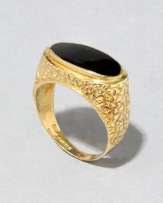 "Find ALEXIS BITTAR Vintage 1970s 18k Handmade Onyx Signet Ring on Editorialist. Details From the 1970s, rich black onyx sits center stage on this striking signet ring on a bold textural hand-etched 18k gold band. For further details, additional photos or a private consultation on this style, please contact service@alexisbittar. com. 18k gold, onyx UPC: 990100069475 Measurements .375\" north/south Care To clean, gently wipe the surface with a soft cloth. For additional care instructions visit our FAQ page. | Vintage 1970S 18K Gold Handmade Onyx Signet Ring in Black Size 9.5 by Alexis Bittar" Vintage Mens Rings, Onyx Signet Ring, Gold Signet Ring, Stacked Bangles, Ring Sale, North South, Alexis Bittar, Earring Sale, Men's Rings