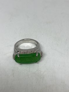 Vintage Lucky Green Nephrite Jade ring Large green nephrite jade Ornate German Silver Vintage ring, does not tarnish, NOT sterling Size 7 only My jeweler can custom re size for a $10-$20 fee All rings are shipped free in the US in a nice gift box. Check out our over a THOUSAND great reviews Engraving is $4 per letter and is not always perfect depending on the piece. It can take a few days if the jeweler is busy. This is payable to Paypal Judithsltd@gmail.com Formal Green Ring With Large Stone, Green Oval Rings With Stone Setting, Green Oval Stone Setting Rings, Oval Green Rings With Stone Setting, Green Oval Rings With Large Stone, Green Oval Ring With Large Stone, Oval Green Ring With Large Stone, Green Round Rings With Stones, Green Gemstone Diamond Open Ring