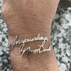 Handwriting Bangle Memorial Handwriting Signature Bracelet | Etsy Personalized Adjustable Signature Jewelry, Personalized Name Bracelet For Anniversary, Personalized Sterling Silver Bracelet For Mom, Personalized Meaningful Name Bracelet, Adjustable Meaningful Jewelry With Custom Name, Meaningful Personalized Name Bracelet For Anniversary, Silver Name Bracelets As Gift For Mom, Personalized Sterling Silver Bracelets As Gift For Mom, Adjustable Signature Name Bracelet As Gift